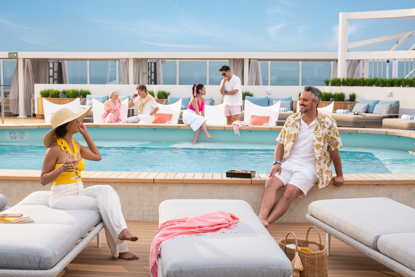 Guests relaxing around the pool at the Sanctuary, Sun Princess, Nowstalgia photography
